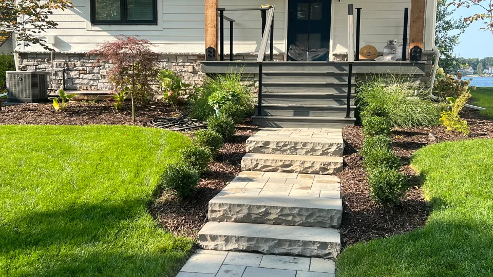 Decorative Flat Stone & Brick Paver Tiered Walkway With Stairs and Mulched Flower Beds