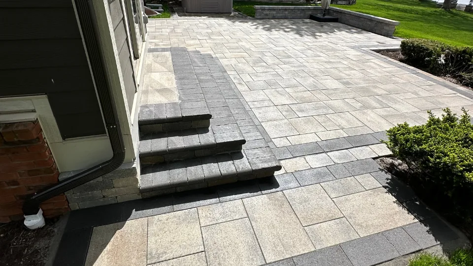 Brick Paver Patio With Retaining Wall and Stairs