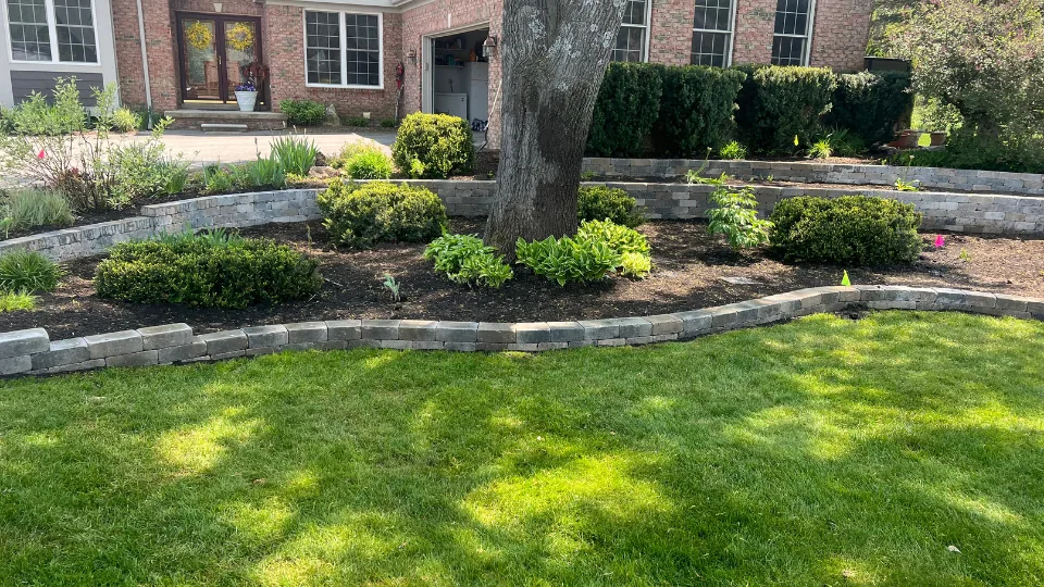 Decorative Block Retaining Wall With Built-In Flower Beds